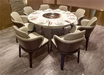 火（huǒ）鍋（guō）店電磁爐大理石八人位圓形火鍋桌