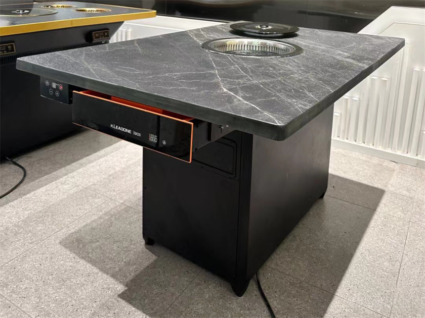 自（zì）助燒肉店火燒石台麵無煙電（diàn）烤烤肉桌