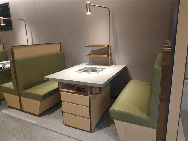 海底撈無煙火鍋桌（zhuō）椅_大理石不（bú）鏽鋼無煙火鍋桌側麵展示（shì）